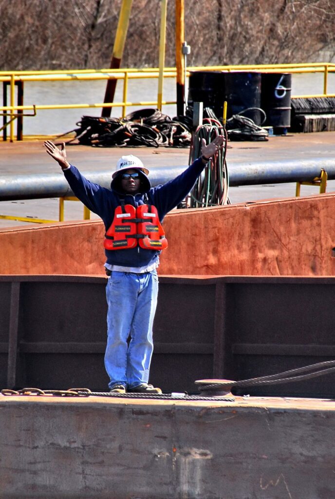 Industrial Photography of Barge Worker